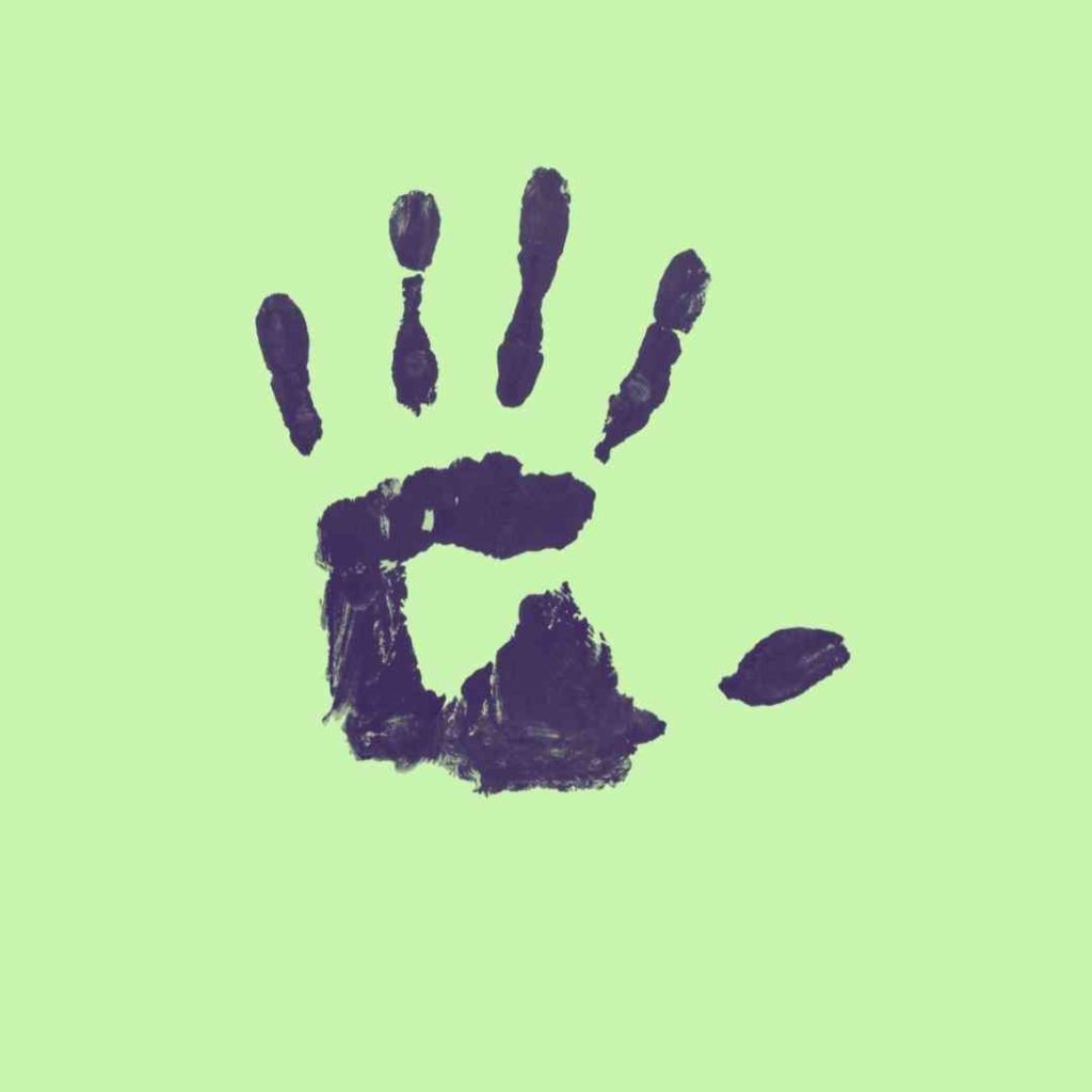 A dark blue handprint sits in a light green square