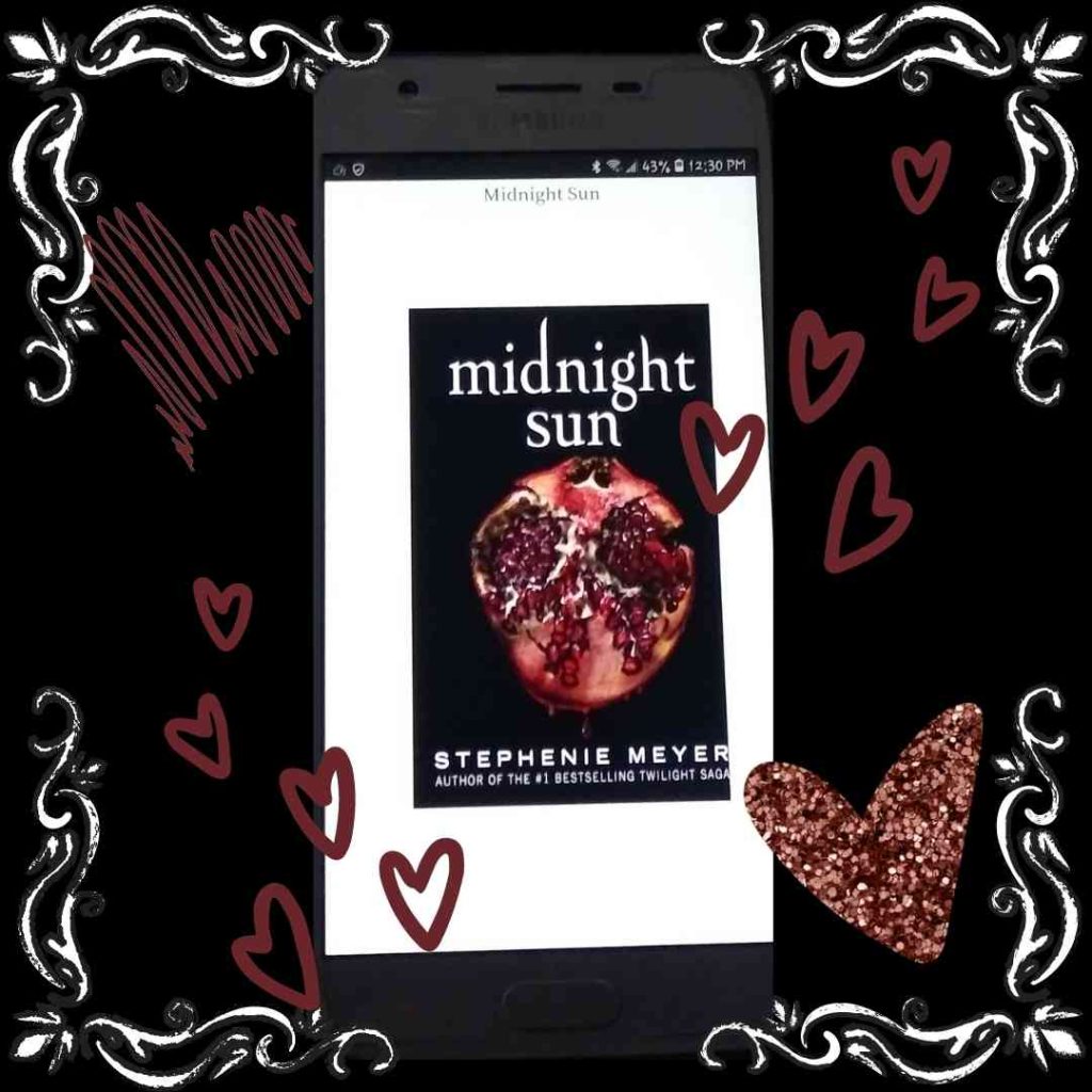 The cover of Stephanie Meyer's midnight sun (pomegranite on black) sits on a dark background with hearts